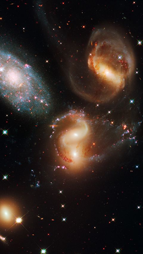 Download wallpaper 2160x3840 galaxy, universe, spirals, stars, cluster, telescope, hubble samsung galaxy s4, s5, note, sony xperia z, z1, z2, z3, htc one, lenovo vibe hd background