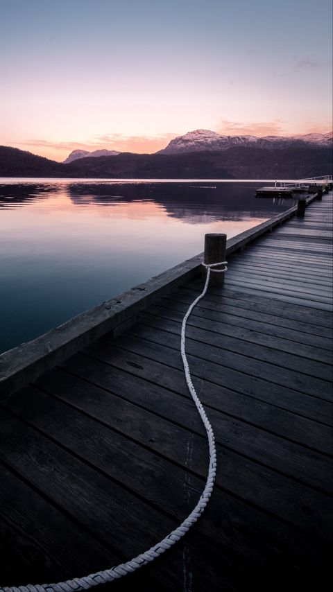 Download wallpaper 2160x3840 pier, mountains, lake, rope, sunset samsung galaxy s4, s5, note, sony xperia z, z1, z2, z3, htc one, lenovo vibe hd background