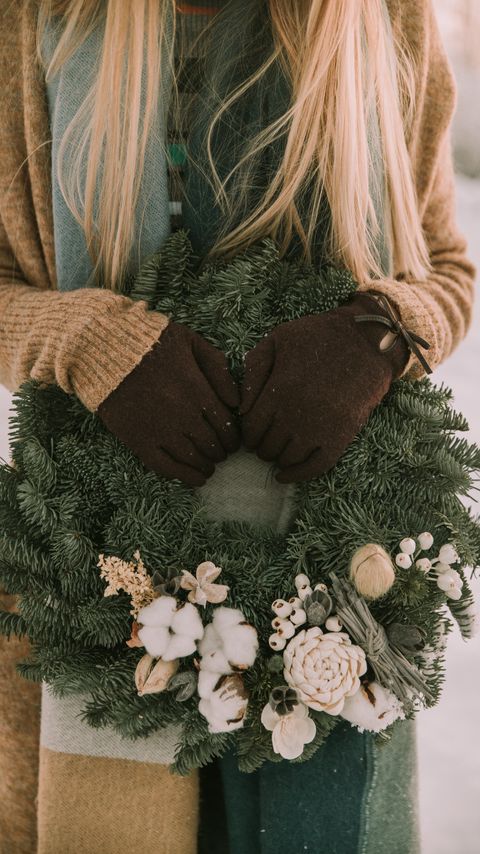 Download wallpaper 2160x3840 wreath, christmas, new year, hands, girl, winter samsung galaxy s4, s5, note, sony xperia z, z1, z2, z3, htc one, lenovo vibe hd background