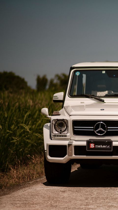 Download wallpaper 2160x3840 mercedes-benz g63 amg, mercedes, car, suv, white, front view samsung galaxy s4, s5, note, sony xperia z, z1, z2, z3, htc one, lenovo vibe hd background