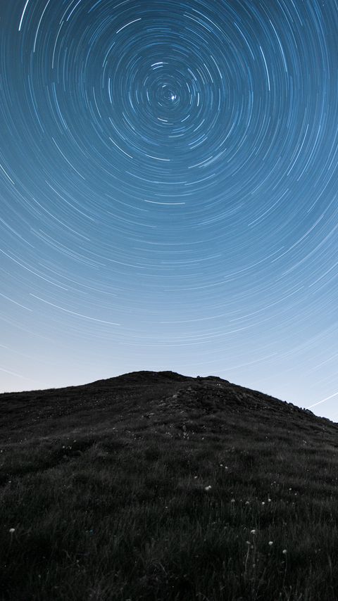Download wallpaper 2160x3840 hill, mountains, starry sky, long exposure, stars, motion samsung galaxy s4, s5, note, sony xperia z, z1, z2, z3, htc one, lenovo vibe hd background