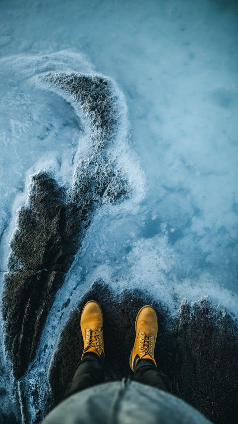 Download wallpaper 2160x3840 legs, boots, water, shore, stone samsung galaxy s4, s5, note, sony xperia z, z1, z2, z3, htc one, lenovo vibe hd background
