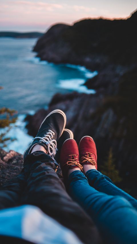 Download wallpaper 2160x3840 legs, shoes, sneakers, cliff, sea samsung galaxy s4, s5, note, sony xperia z, z1, z2, z3, htc one, lenovo vibe hd background