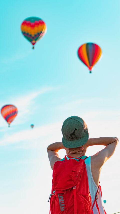 Download wallpaper 2160x3840 man, balloons, sky, cap, backpack samsung galaxy s4, s5, note, sony xperia z, z1, z2, z3, htc one, lenovo vibe hd background