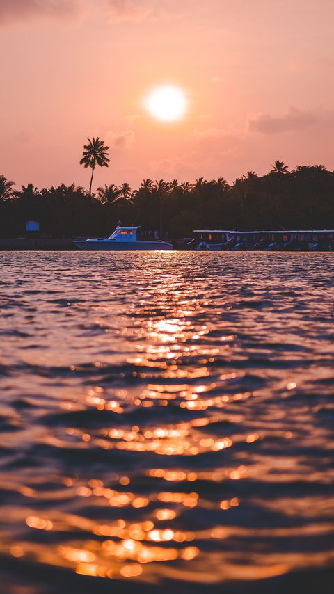 Download wallpaper 2160x3840 sunset, waves, water, boat, palm trees samsung galaxy s4, s5, note, sony xperia z, z1, z2, z3, htc one, lenovo vibe hd background