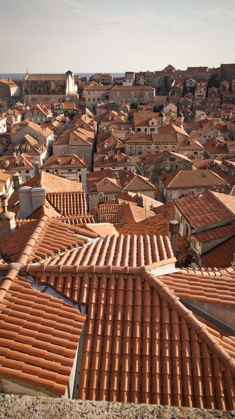 Download wallpaper 2160x3840 buildings, roofs, aerial view, city samsung galaxy s4, s5, note, sony xperia z, z1, z2, z3, htc one, lenovo vibe hd background