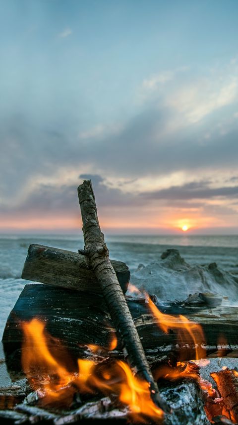 Download wallpaper 2160x3840 bonfire, flame, logs, coals, sunset samsung galaxy s4, s5, note, sony xperia z, z1, z2, z3, htc one, lenovo vibe hd background