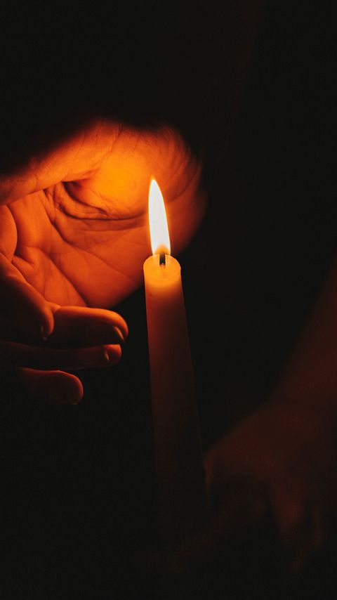 Download wallpaper 2160x3840 candle, hands, flame, dark samsung galaxy s4, s5, note, sony xperia z, z1, z2, z3, htc one, lenovo vibe hd background