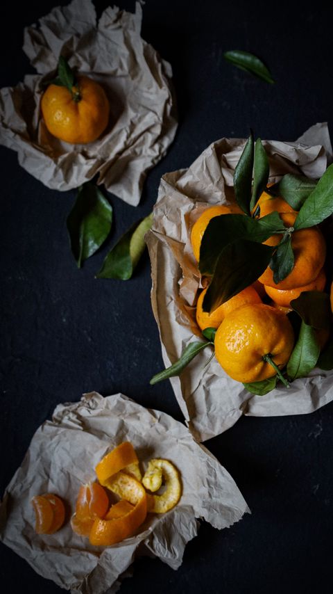 Download wallpaper 2160x3840 tangerines, fruits, citrus, wedges, zest samsung galaxy s4, s5, note, sony xperia z, z1, z2, z3, htc one, lenovo vibe hd background