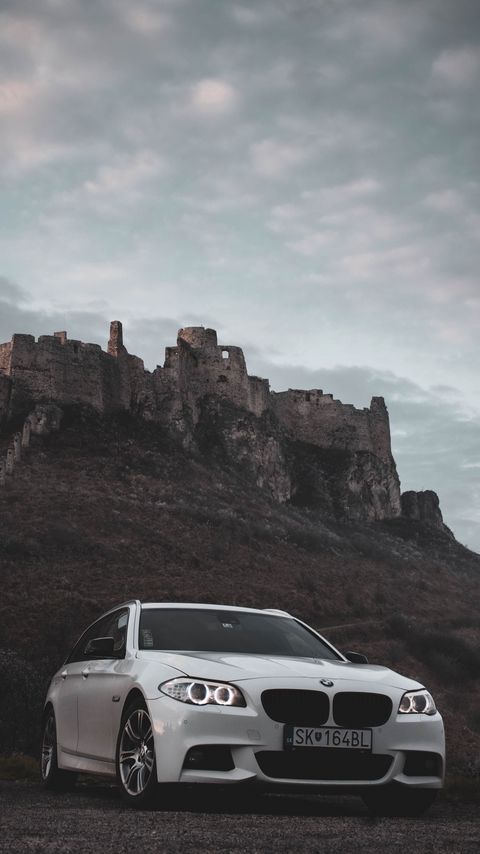 Download wallpaper 2160x3840 bmw, car, white, front view, rock, nature samsung galaxy s4, s5, note, sony xperia z, z1, z2, z3, htc one, lenovo vibe hd background