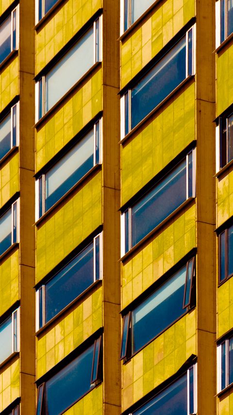 Download wallpaper 2160x3840 building, facade, windows, architecture, yellow samsung galaxy s4, s5, note, sony xperia z, z1, z2, z3, htc one, lenovo vibe hd background