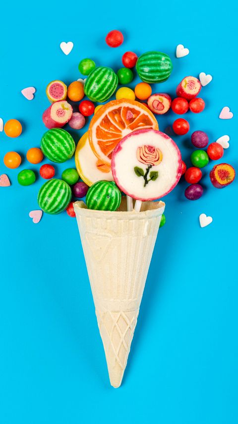 Download wallpaper 2160x3840 candy, lollipops, horn, sweets samsung galaxy s4, s5, note, sony xperia z, z1, z2, z3, htc one, lenovo vibe hd background