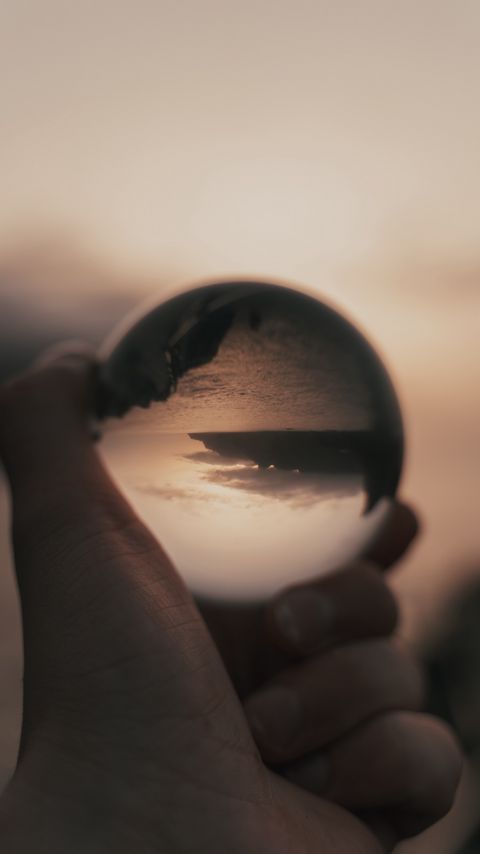 Download wallpaper 2160x3840 crystal ball, ball, hand, reflection, illusion samsung galaxy s4, s5, note, sony xperia z, z1, z2, z3, htc one, lenovo vibe hd background