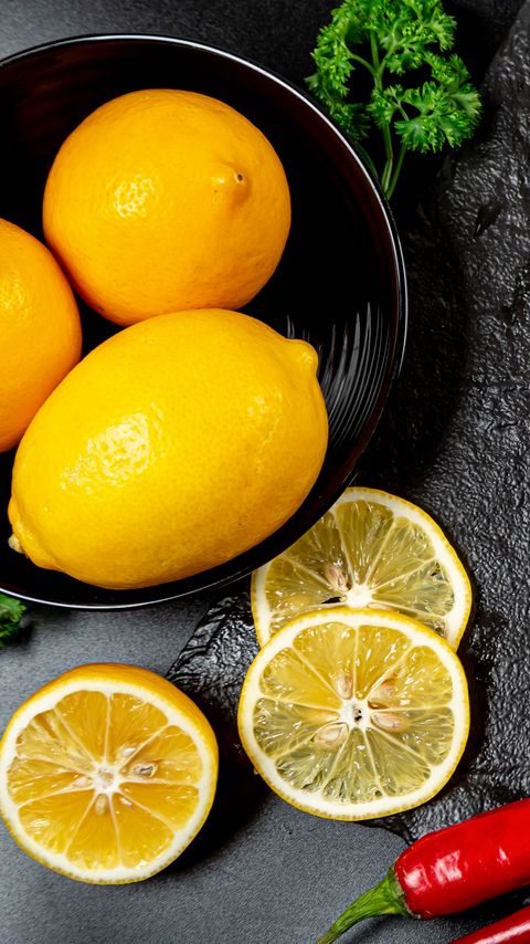 Download wallpaper 2160x3840 lemon, slices, citrus, pepper, parsley, cooking samsung galaxy s4, s5, note, sony xperia z, z1, z2, z3, htc one, lenovo vibe hd background