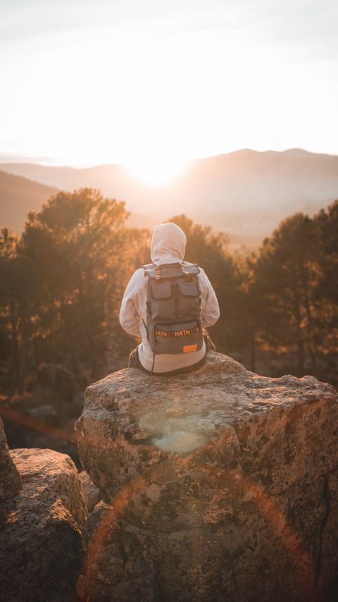 Download wallpaper 2160x3840 man, backpack, hood, nature, alone samsung galaxy s4, s5, note, sony xperia z, z1, z2, z3, htc one, lenovo vibe hd background