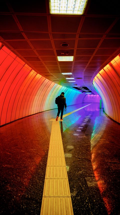 Download wallpaper 2160x3840 man, tunnel, backlight, colorful, rainbow samsung galaxy s4, s5, note, sony xperia z, z1, z2, z3, htc one, lenovo vibe hd background