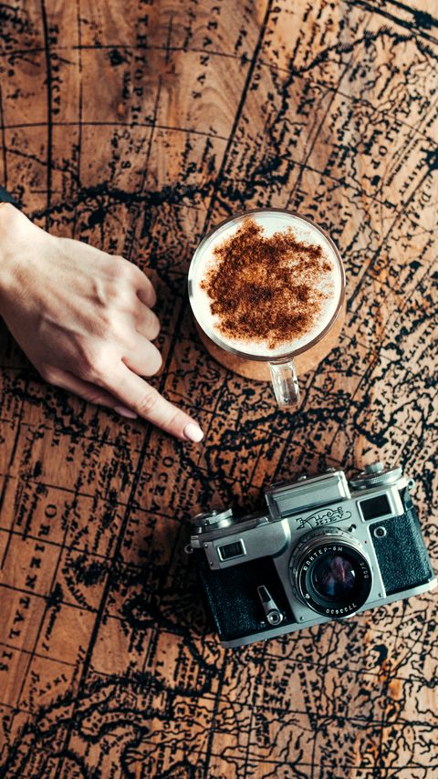 Download wallpaper 2160x3840 map, hand, cup, camera samsung galaxy s4, s5, note, sony xperia z, z1, z2, z3, htc one, lenovo vibe hd background