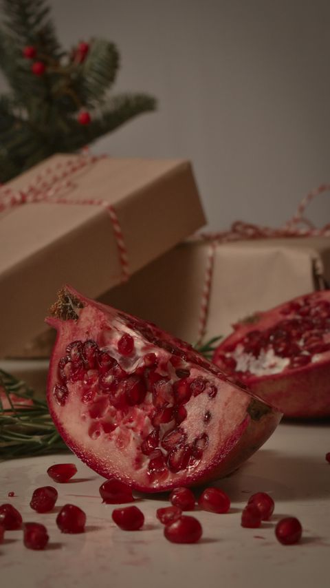 Download wallpaper 2160x3840 pomegranate, fruit, slices, red, boxes, branches samsung galaxy s4, s5, note, sony xperia z, z1, z2, z3, htc one, lenovo vibe hd background