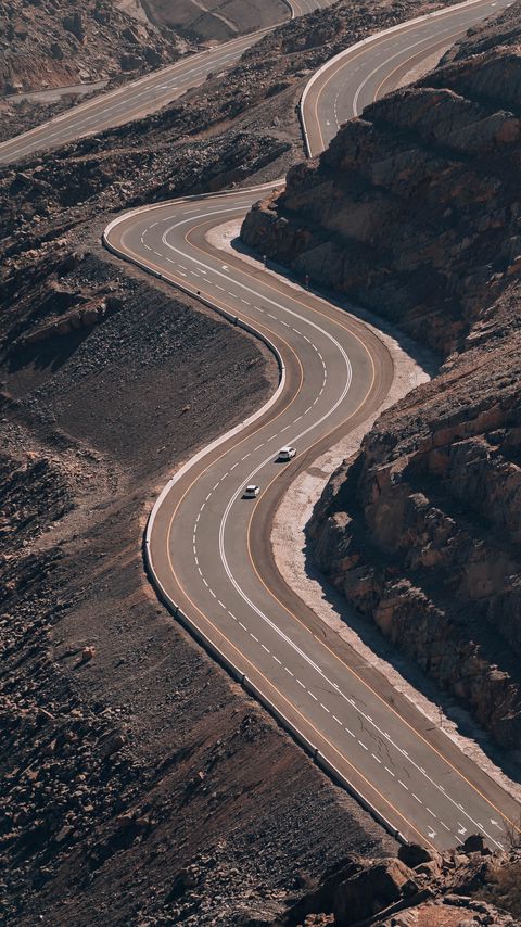 Download wallpaper 2160x3840 road, cars, mountain, slope, aerial view samsung galaxy s4, s5, note, sony xperia z, z1, z2, z3, htc one, lenovo vibe hd background