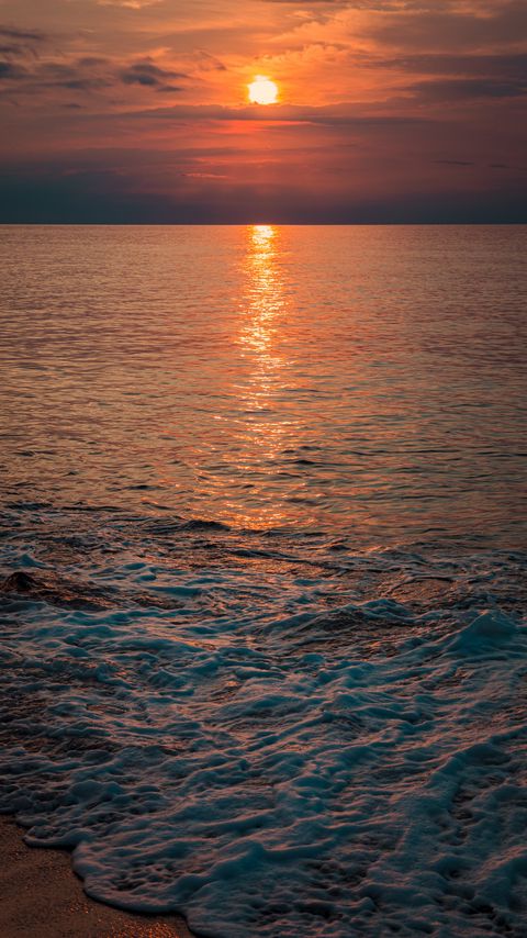 Download wallpaper 2160x3840 sea, sunset, waves, shore, water samsung galaxy s4, s5, note, sony xperia z, z1, z2, z3, htc one, lenovo vibe hd background