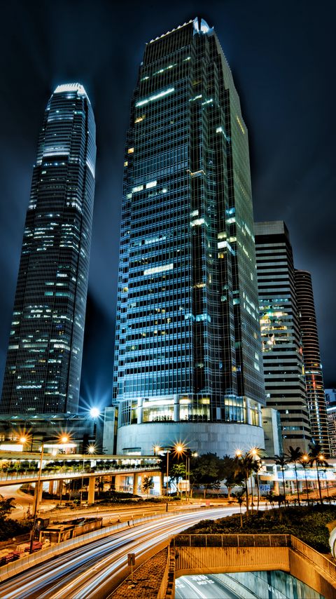 Download wallpaper 2160x3840 skyscrapers, buildings, city, night, lights, long exposure samsung galaxy s4, s5, note, sony xperia z, z1, z2, z3, htc one, lenovo vibe hd background