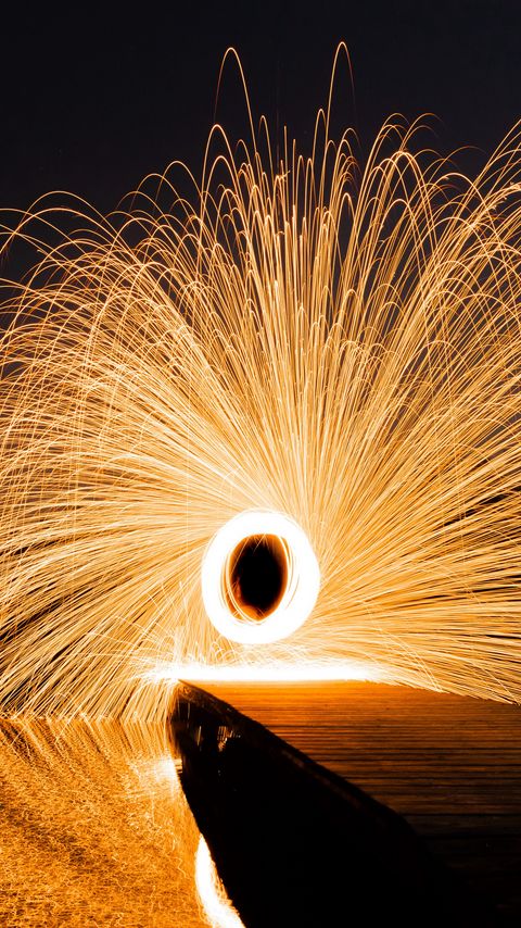 Download wallpaper 2160x3840 sparks, circle, freezelight, light, movement, long exposure samsung galaxy s4, s5, note, sony xperia z, z1, z2, z3, htc one, lenovo vibe hd background