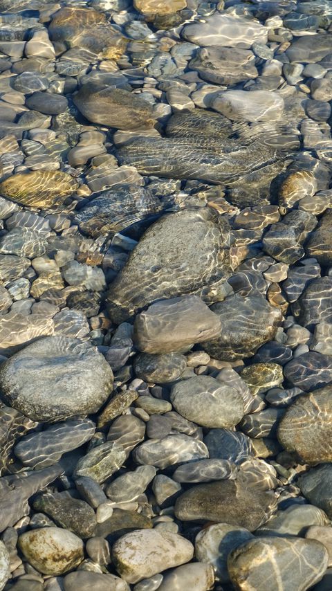 Download wallpaper 2160x3840 stones, water, ripples, transparent samsung galaxy s4, s5, note, sony xperia z, z1, z2, z3, htc one, lenovo vibe hd background