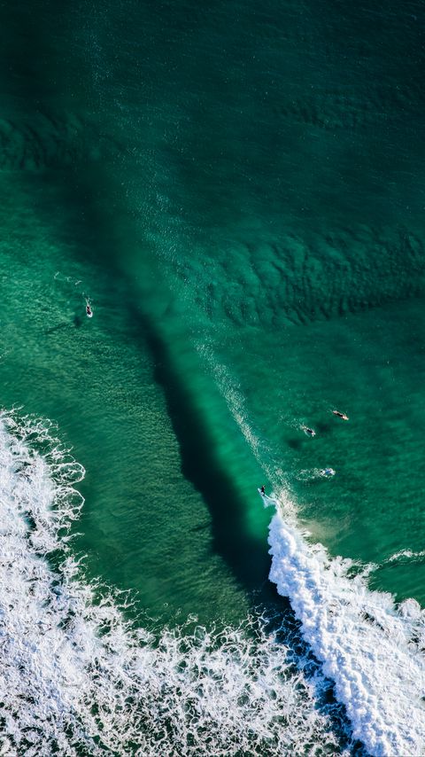 Download wallpaper 2160x3840 wave, surfers, aerial view, water, ocean samsung galaxy s4, s5, note, sony xperia z, z1, z2, z3, htc one, lenovo vibe hd background