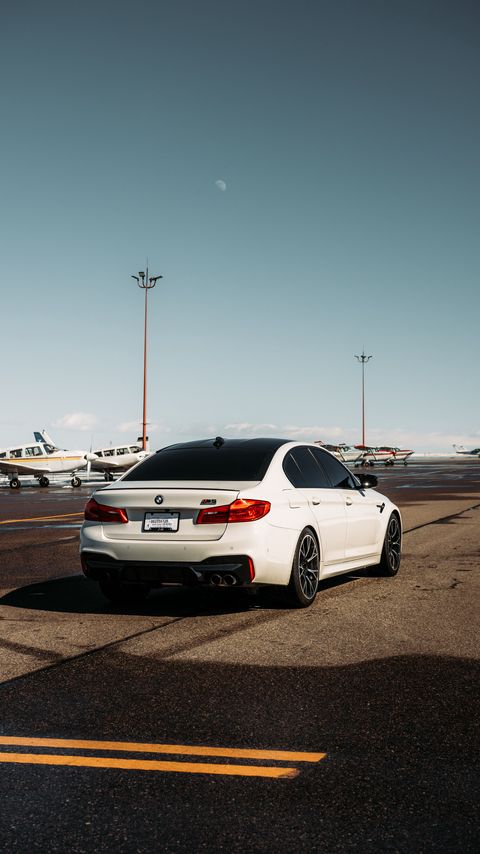 Download wallpaper 2160x3840 bmw m5, bmw, car, white, airport samsung galaxy s4, s5, note, sony xperia z, z1, z2, z3, htc one, lenovo vibe hd background