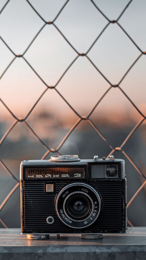 Download wallpaper 2160x3840 camera, retro, fence, mesh, blur samsung galaxy s4, s5, note, sony xperia z, z1, z2, z3, htc one, lenovo vibe hd background