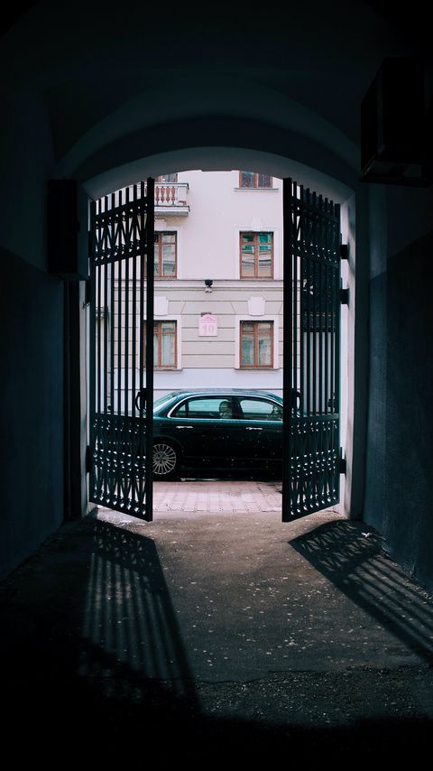 Download wallpaper 2160x3840 car, black, gate, building, street samsung galaxy s4, s5, note, sony xperia z, z1, z2, z3, htc one, lenovo vibe hd background