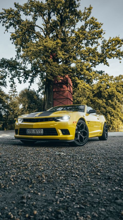 Download wallpaper 2160x3840 chevrolet camaro, chevrolet, car, sports car, yellow samsung galaxy s4, s5, note, sony xperia z, z1, z2, z3, htc one, lenovo vibe hd background