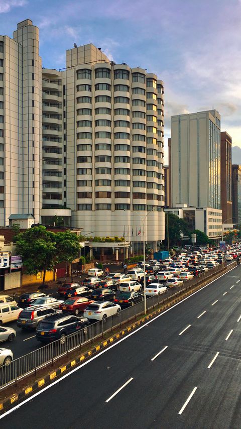 Download wallpaper 2160x3840 city, buildings, road, markings, cars samsung galaxy s4, s5, note, sony xperia z, z1, z2, z3, htc one, lenovo vibe hd background