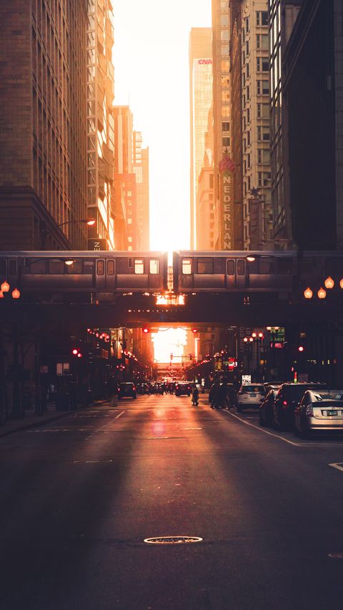 Download wallpaper 2160x3840 city, road, buildings, train, street, sunset samsung galaxy s4, s5, note, sony xperia z, z1, z2, z3, htc one, lenovo vibe hd background