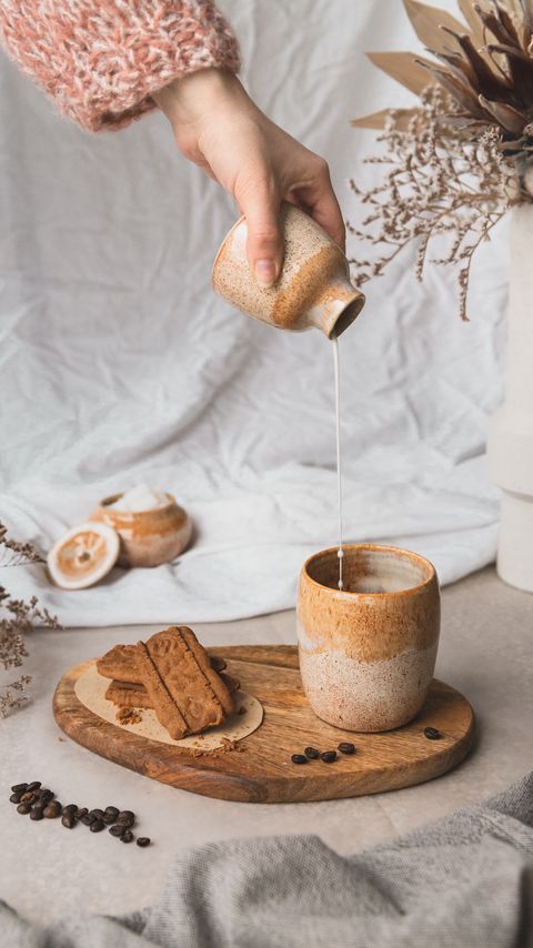 Download wallpaper 2160x3840 cup, hand, milk, cookies, coffee beans, aesthetics samsung galaxy s4, s5, note, sony xperia z, z1, z2, z3, htc one, lenovo vibe hd background