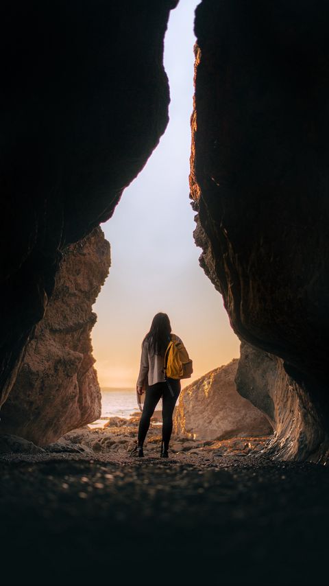 Download wallpaper 2160x3840 girl, alone, cave, sunset samsung galaxy s4, s5, note, sony xperia z, z1, z2, z3, htc one, lenovo vibe hd background