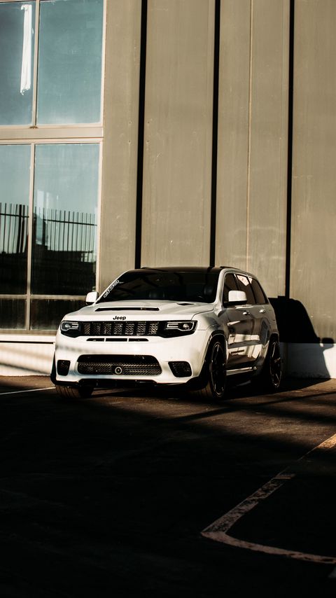 Download wallpaper 2160x3840 jeep, car, suv, white, building, parking samsung galaxy s4, s5, note, sony xperia z, z1, z2, z3, htc one, lenovo vibe hd background