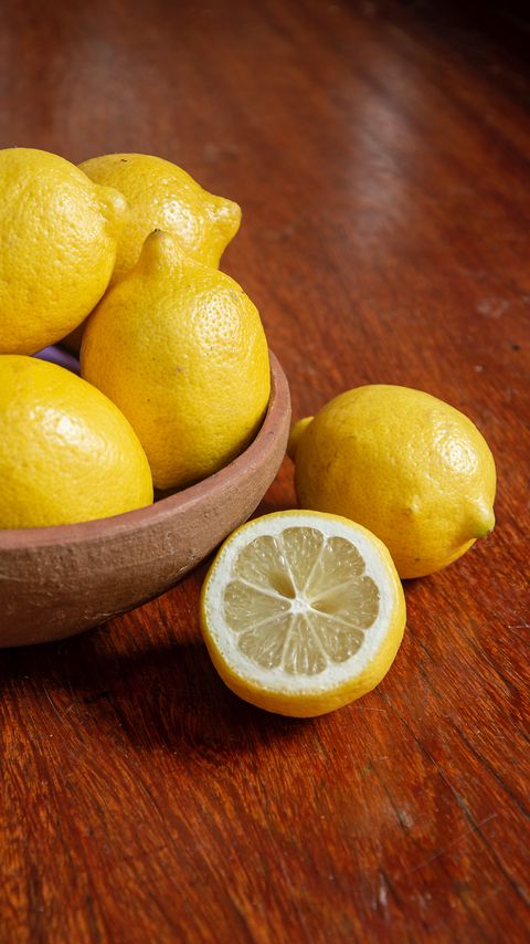 Download wallpaper 2160x3840 lemons, citrus, fruit, bowl, yellow samsung galaxy s4, s5, note, sony xperia z, z1, z2, z3, htc one, lenovo vibe hd background