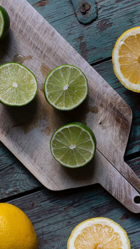 Download wallpaper 2160x3840 lime, lemons, citrus, fruit, board samsung galaxy s4, s5, note, sony xperia z, z1, z2, z3, htc one, lenovo vibe hd background