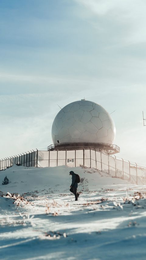 Download wallpaper 2160x3840 man, alone, building, ball, snow, winter, white samsung galaxy s4, s5, note, sony xperia z, z1, z2, z3, htc one, lenovo vibe hd background