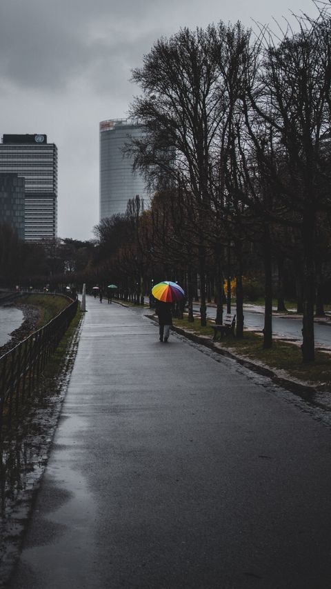 Download wallpaper 2160x3840 man, alone, rain, umbrella, embankment, city samsung galaxy s4, s5, note, sony xperia z, z1, z2, z3, htc one, lenovo vibe hd background