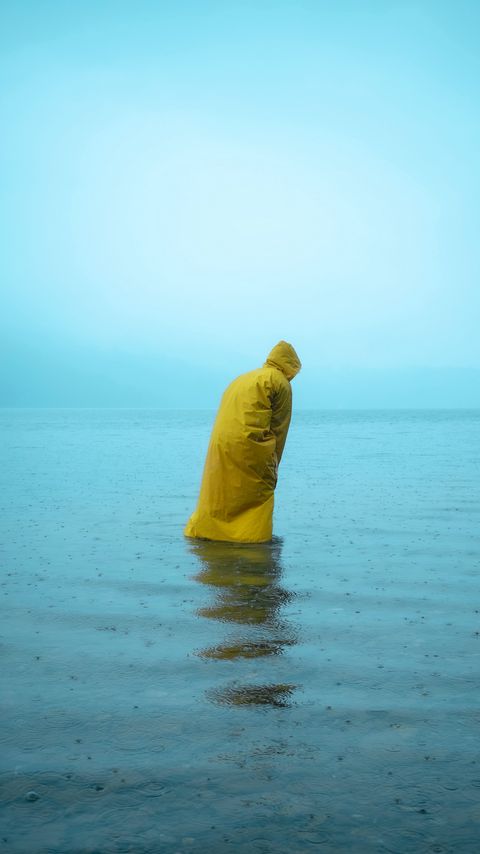 Download wallpaper 2160x3840 man, alone, raincoat, water, rain samsung galaxy s4, s5, note, sony xperia z, z1, z2, z3, htc one, lenovo vibe hd background