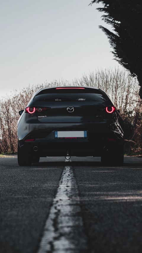 Download wallpaper 2160x3840 mazda 3, mazda, car, black, back view, road samsung galaxy s4, s5, note, sony xperia z, z1, z2, z3, htc one, lenovo vibe hd background