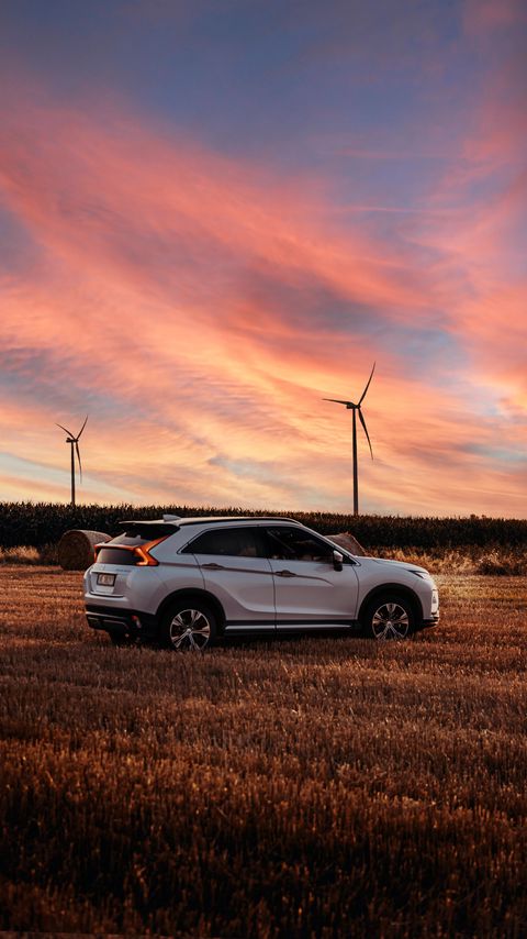 Download wallpaper 2160x3840 mitsubishi eclipse cross, mitsubishi, vehicle, suv, white, field, sunset samsung galaxy s4, s5, note, sony xperia z, z1, z2, z3, htc one, lenovo vibe hd background