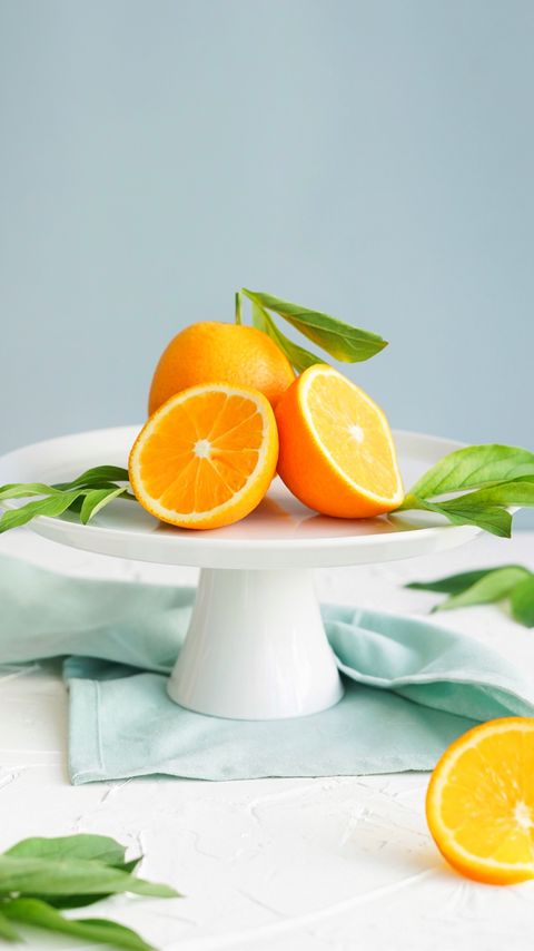 Download wallpaper 2160x3840 oranges, slices, leaves, fruit, citrus samsung galaxy s4, s5, note, sony xperia z, z1, z2, z3, htc one, lenovo vibe hd background