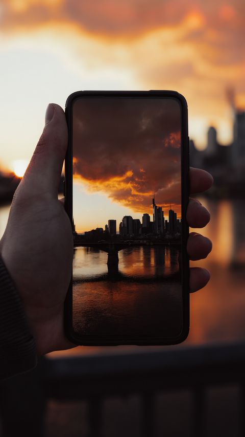 Download wallpaper 2160x3840 phone, snapshot, photo, hand, city, sunset samsung galaxy s4, s5, note, sony xperia z, z1, z2, z3, htc one, lenovo vibe hd background