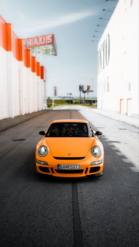 Download wallpaper 2160x3840 porsche 911, porsche, car, orange, road samsung galaxy s4, s5, note, sony xperia z, z1, z2, z3, htc one, lenovo vibe hd background