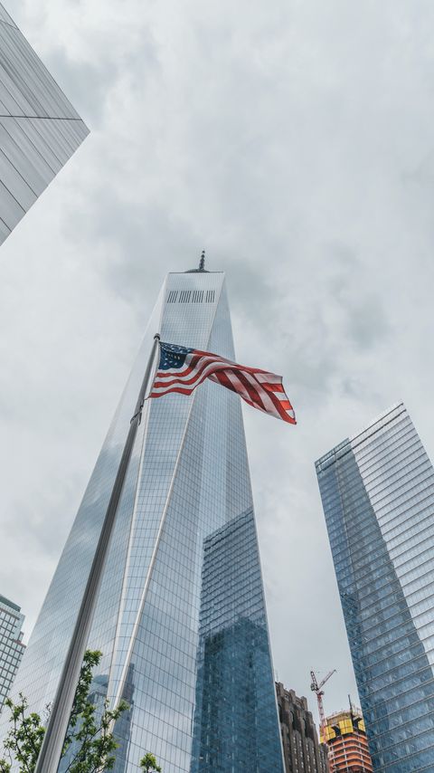 Download wallpaper 2160x3840 skyscrapers, buildings, glass, architecture, flag, usa samsung galaxy s4, s5, note, sony xperia z, z1, z2, z3, htc one, lenovo vibe hd background