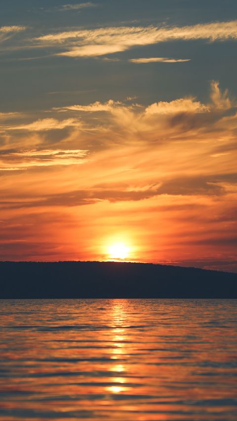 Download wallpaper 2160x3840 sunset, sun, water, island, horizon samsung galaxy s4, s5, note, sony xperia z, z1, z2, z3, htc one, lenovo vibe hd background