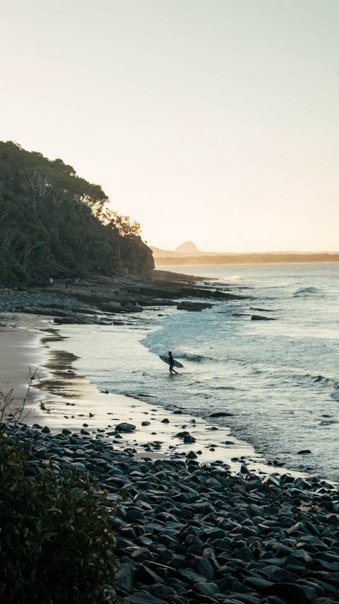 Download wallpaper 2160x3840 surfer, silhouette, beach, ocean, waves, water samsung galaxy s4, s5, note, sony xperia z, z1, z2, z3, htc one, lenovo vibe hd background